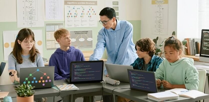 A sharp, vibrant, and photorealistic photograph of a modern computer science classroom scene, derived from image_11.png. The scene is immaculate and polished, with a rich, colorful palette. The five students and the instructor remain in their exact poses, but their clothing and all surfaces are rendered in saturated, clean colors. The wall posters (like 'Algorithms and Data Structures' and the flowchart) are pristine with crisp text and colorful diagrams