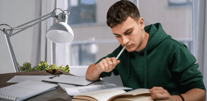 A happy student learning quickly using modern smart learning methods at home.